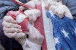 Tearing US Flag